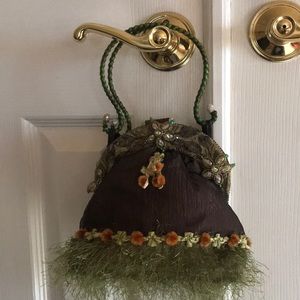 Marcy Frances statement brown purse